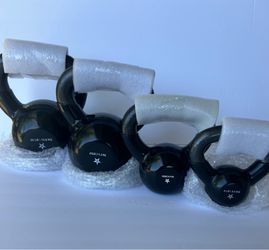 New kettlebell set 30 pounds 25 pounder 10 pounder and a five pounder