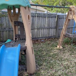 Kids out doors swing, slide, basket ball