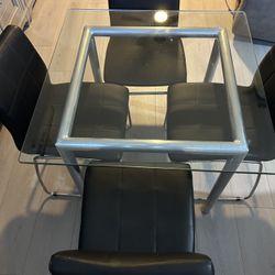 Glass Table & 4 Chairs - $95 OBO