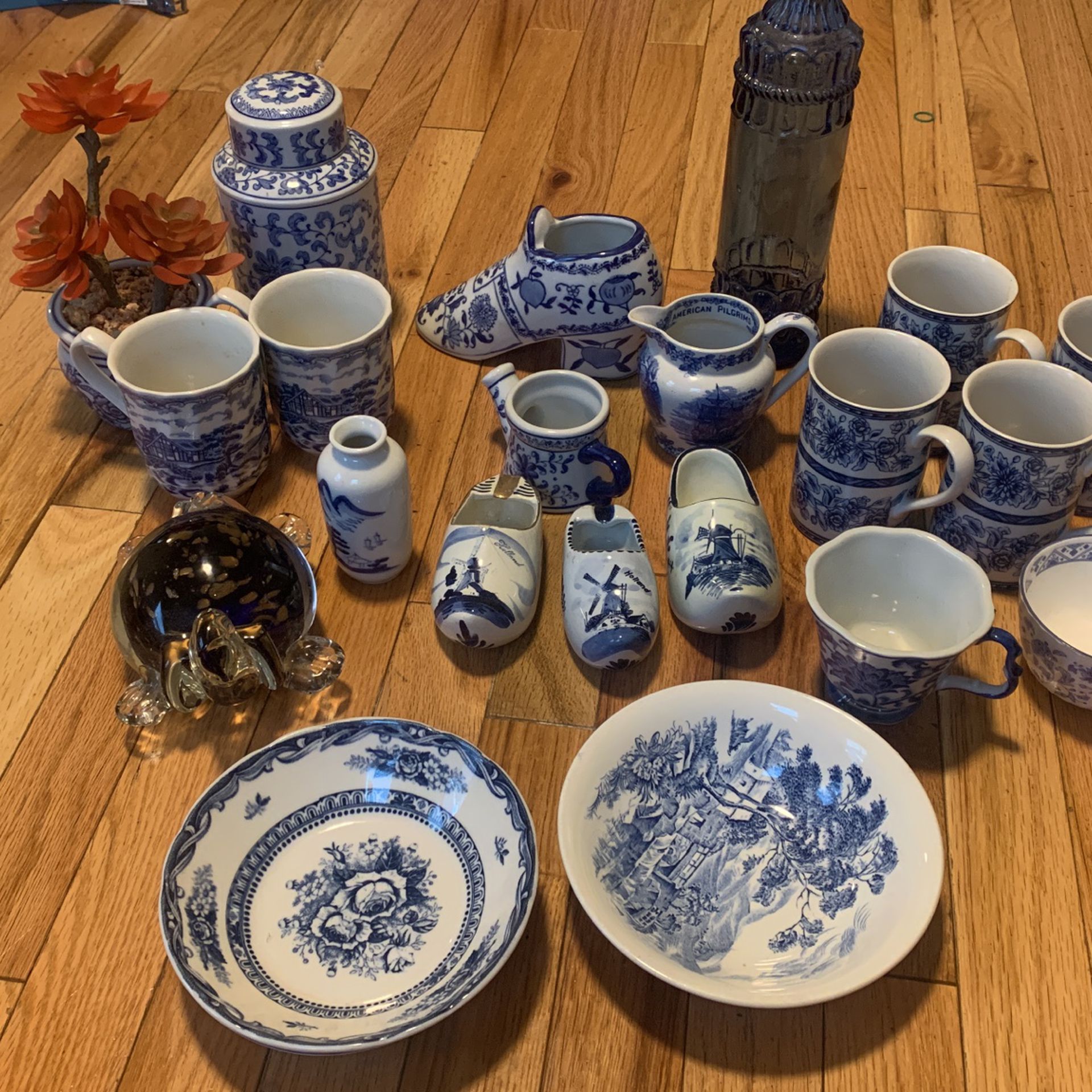 23 piece of blue, white clear bundle ( cups, bowls, ashtray, creamer pourer etc)