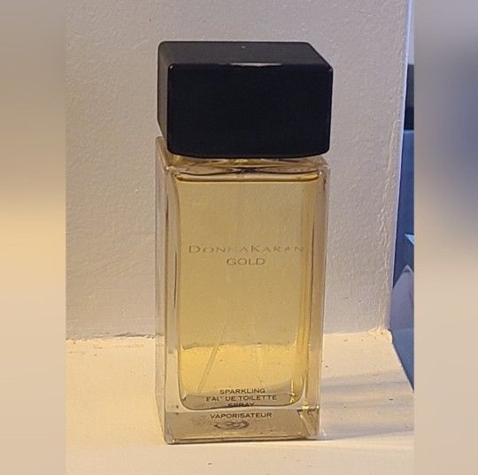 Donna Karan Gold Sparkling by Donna Karan Eau De Toilette Spray 3.4 oz





