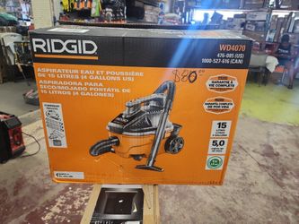 RIDGID
4 Gal. 5.0 Peak HP Portable Shop Vacuum Wet Dry Vac with Fine Dust Filter, Locking Hose and Attachments WD4070