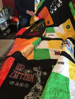 Rock & Roll quilt about 10/15 yrs old and new made with concert t-shirts and it’s AWESOME VERY COOL HAVE TO SEE IT UP CLOSE