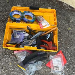 yellow tool box with tools and screws