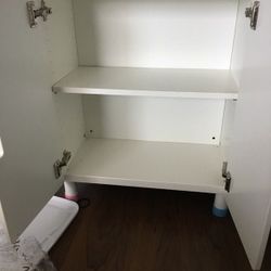 Three White Cabinets