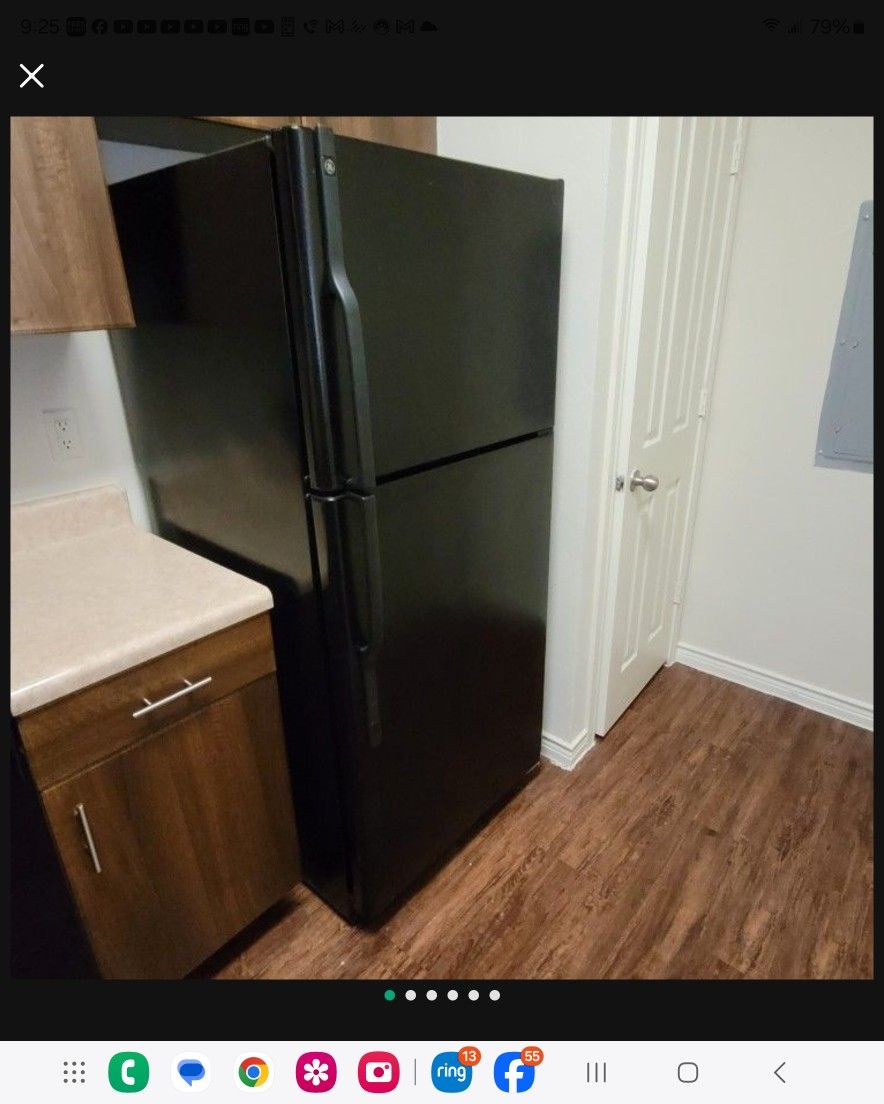 Black GE Two Door Refrigerator