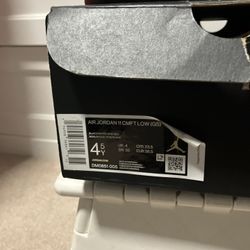 The Size 4.5 (GS) Jordan 11 CMFT Low Bred 