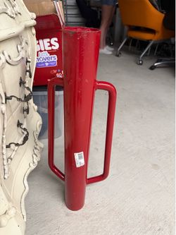 heavy-duty red steel T-post driver aerator pick up in Orting