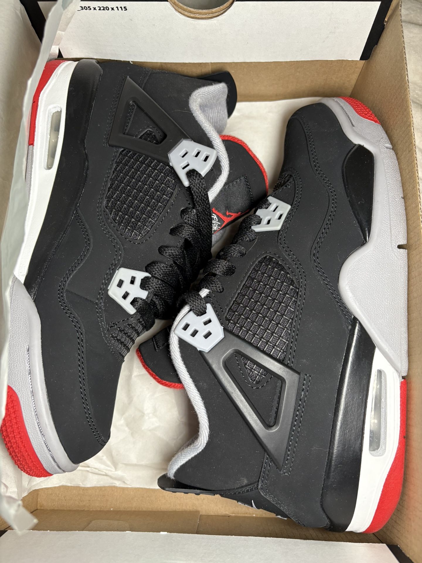 Jordan 4 Retro “Bred” (2019) – Size 7Y