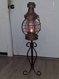 Vintage candle burning stand