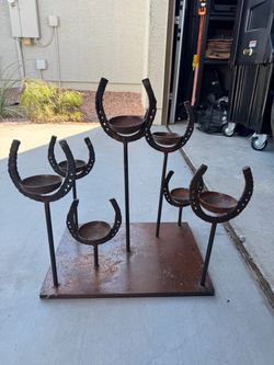 Horse shoe candle holder