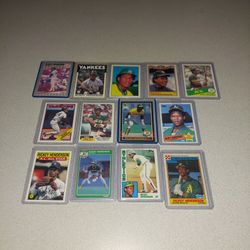 13 DIFFERENT HALL OF FAMER RICKEY HENDERSON CARDS IN PLASTIC 