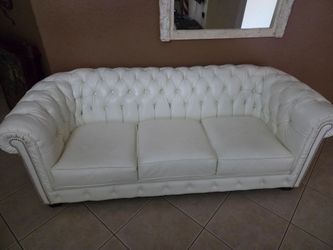 White faux leather couch
