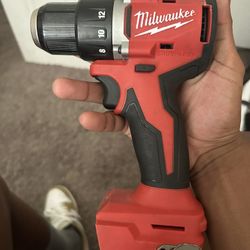 Milwaukee Drill And Impact Driver  W/ 5.0 & 2.0 Battery