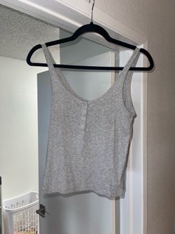 small grey tank top, more like medium, female