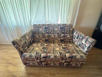 Patterned Fabric Loveseat Sofa becomes bed as well