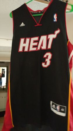 Dwayne Wade Miami Heat Jersey size Medium. Good condition but the color on the back number has faded slightly. (See picture)