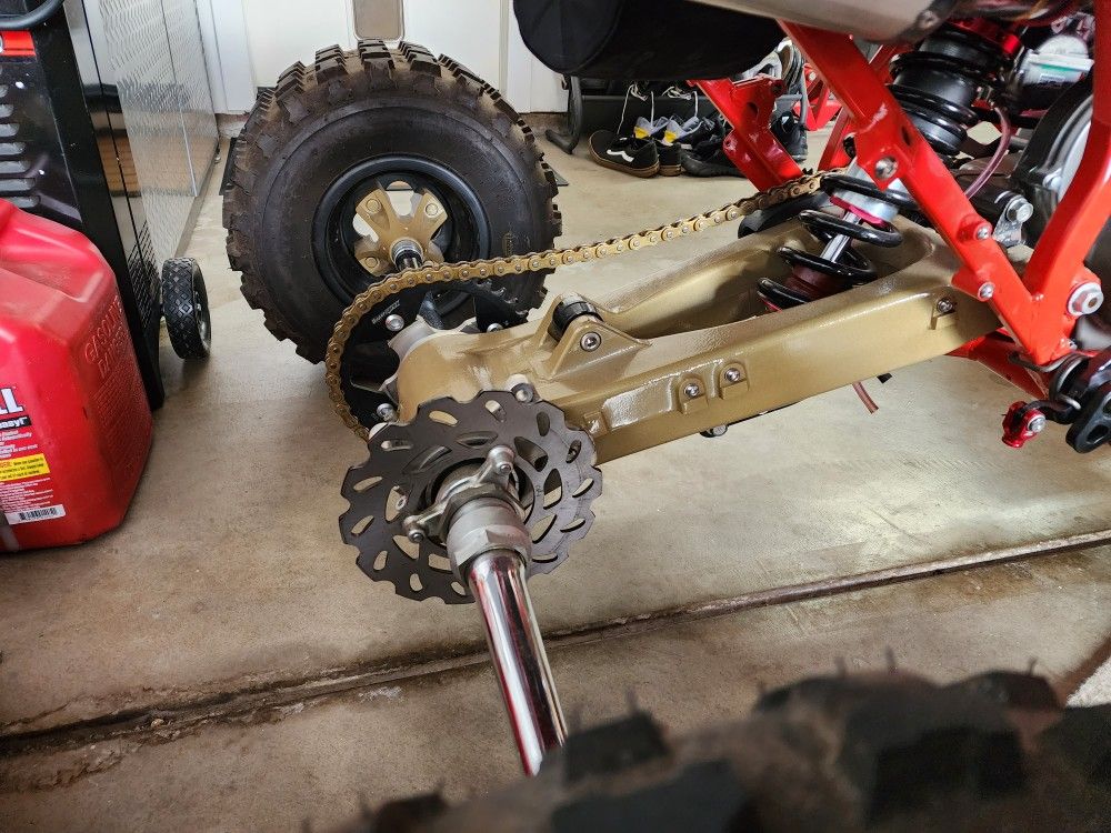 Trx450r Swingarm, Axle, hubs, sprocket, rotor. for Sale in Escalon, CA