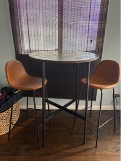 High table with 2 vegan leather chairs