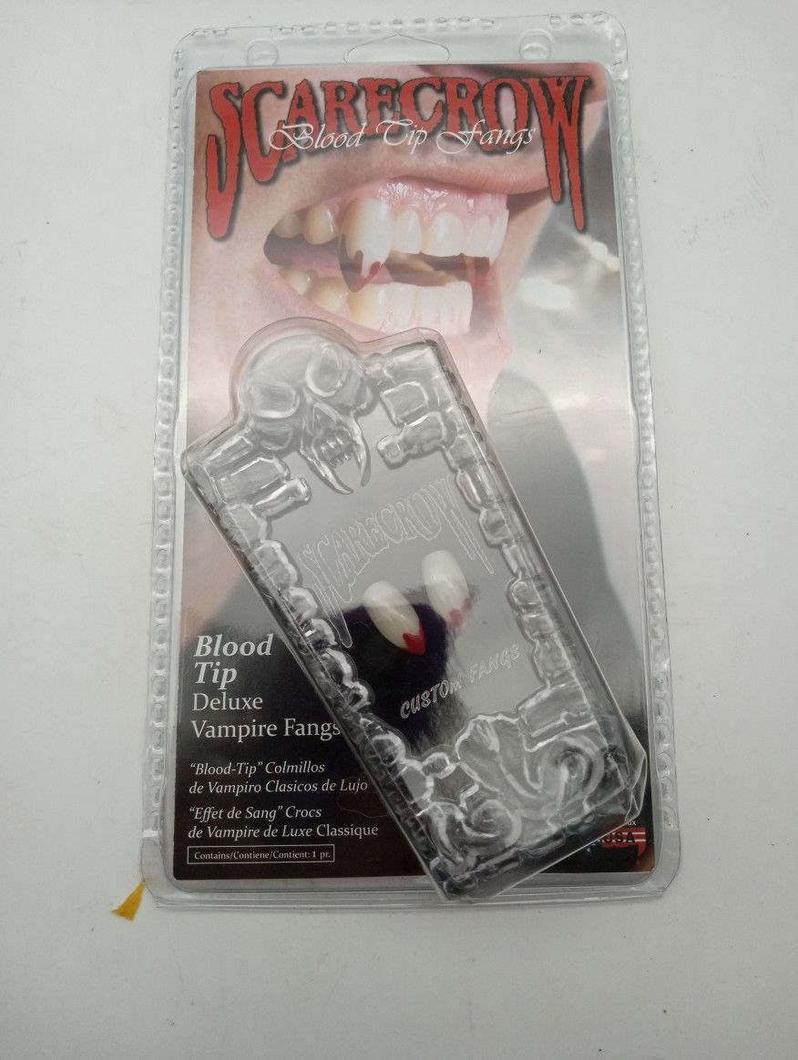Vampire fangs. Vampire. Fangs. Blood tips . Halloween.