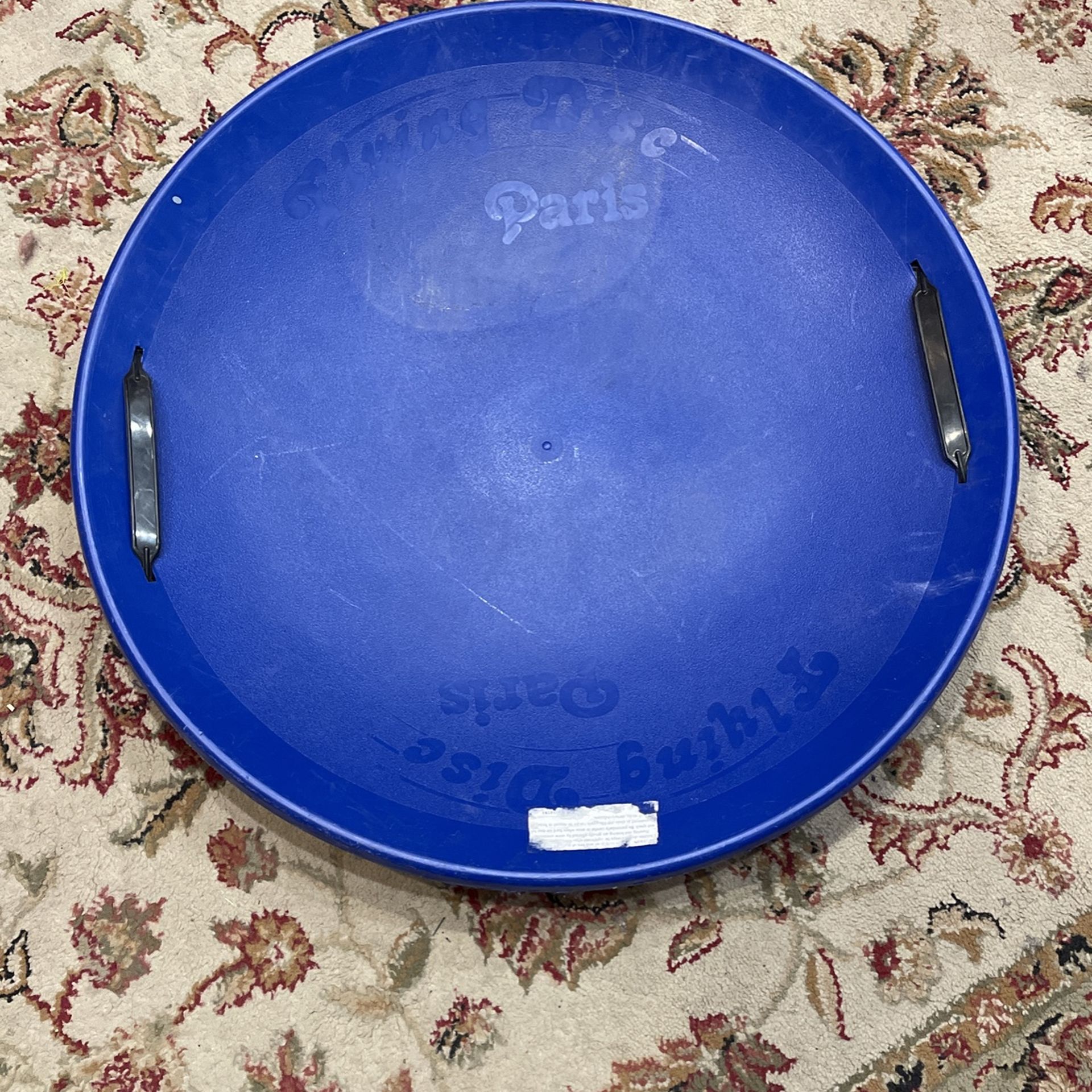 Blue 25 1/2 inch flying snow disc Paris for sledding at Mount Charleston
