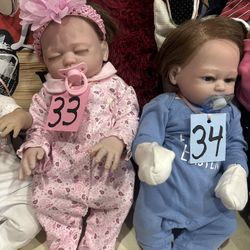 Cute vinyl baby twins