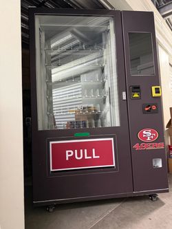 Vending machine brand new $3500 paid $4500 it has an elevator for cold drinks and snacks