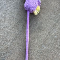 plush unicorn stick horse toy, also known as a hobby horse
