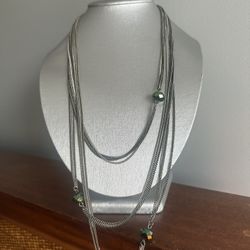 New York & Co Elegant Multi-layer silver-tone long chain with blue accents.