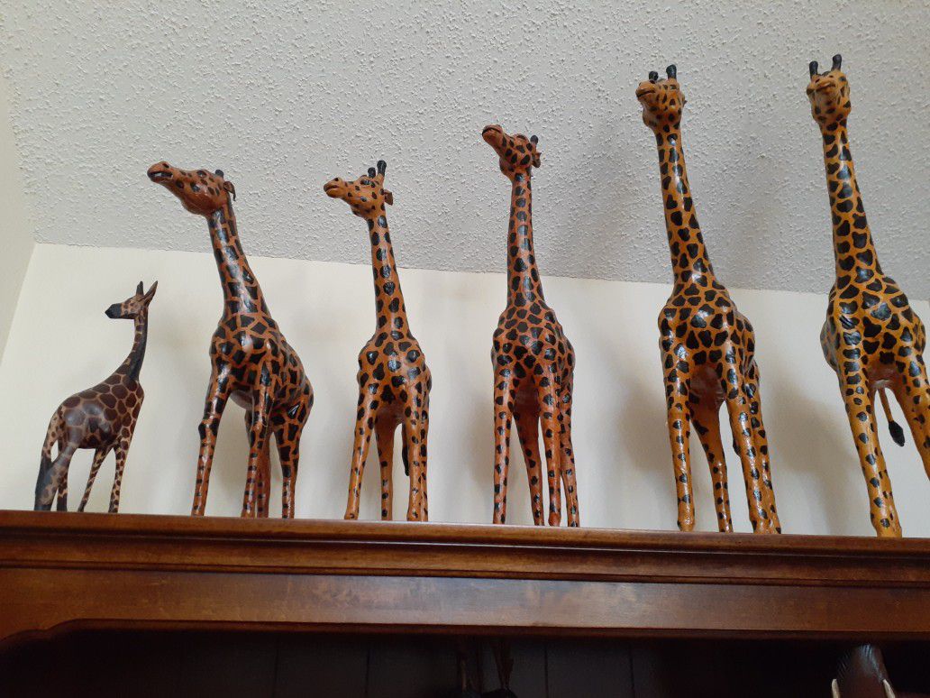 6 GIRAFFES 3 TIGERS. AND 2 CAMELS. NICE DECORATIVE FIGURES 75.00. FOR ALL