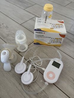 Breast Pump And Milk Containers