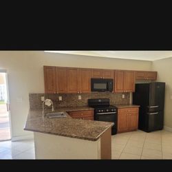 All Granite For Sale Cheap. Microwave As Well. Negotiable Price. 3 Cabinets Left For Sale Too 