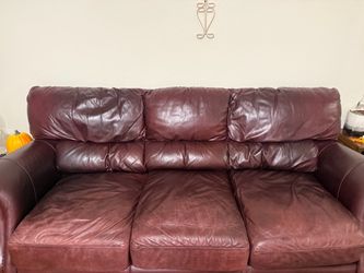2 leather sofas / couches