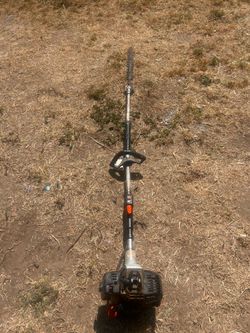 Long reach gas powered hedge trimmer
