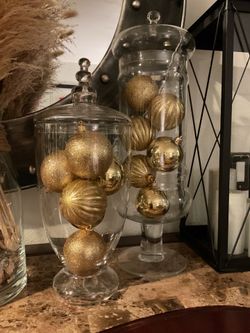 Glass jar with gold ornaments