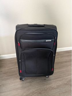 Large black Samsonite spinner luggage - zippers work good but missing all but one pull - you can use string or buy some. Handle can be difficult at ti