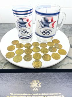 1984 Los Angeles Olympics RTD Tokens (22) + 2 Olympic Glasses – N. Neil Harris