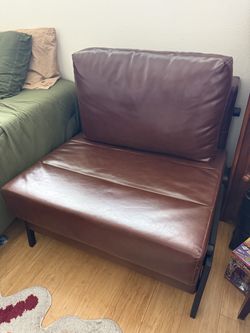 Brown leather chair / bed