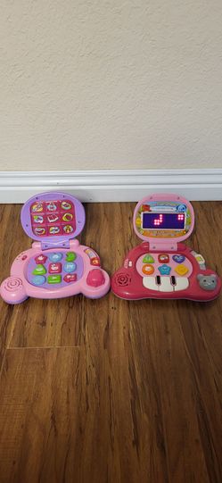 Practically New Learning Laptop Toy With Sounds, Lights And Music  ( $15 Each).