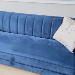 Blue sofa and loveseat