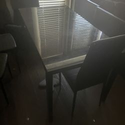 Glass Dinning Room Table With 5 Chairs. L Shaped Couch 