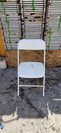 Used white folding chairs s,a,l,e