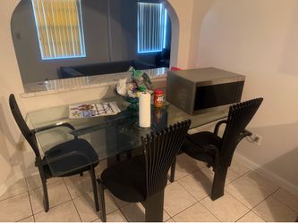 Glass table with chairs
