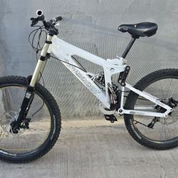 Awesome Santa Cruz V10 downhill mountain bike. Full suspension. RockShox forks. Kenda tires. Promax seatpost. Seat tube length about 16.5 inches.$499