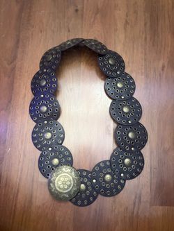 Brown and gold belt