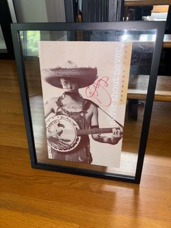 Christofer Drew of Never Shout Never signed poster for Harmony release.