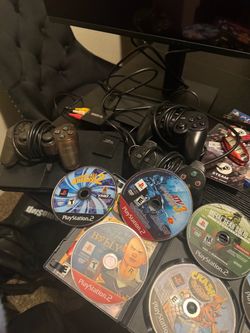 Ps2 slim with games