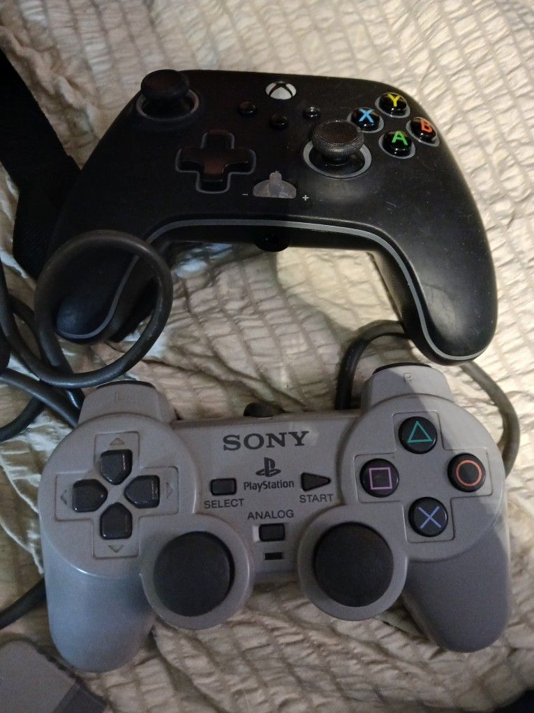 Xbox One Contrtoler And A Sony Playstation Controller