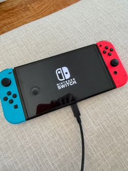 NINTENDO SWITCH OLED WITH GAMES CONSOLE MOUNT AND CORD