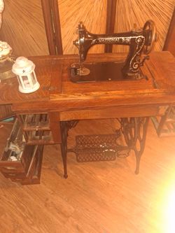 National Antique Treadle Sewing Machine with Cabinet